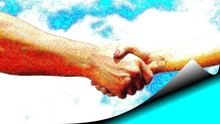 Männliche und weibliche Hand im handshake